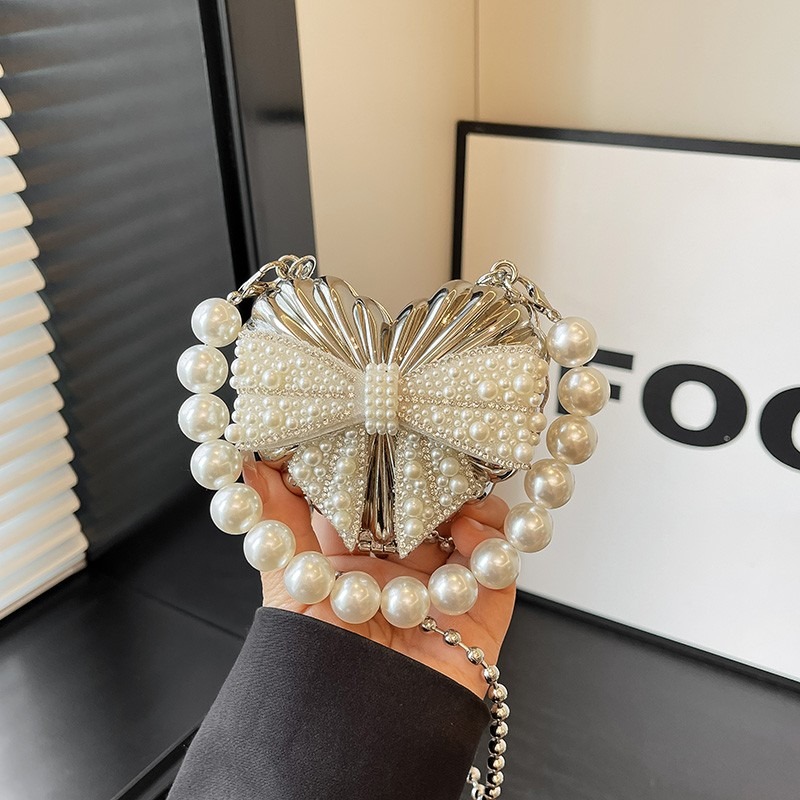 Glinsterende hartvormige clutc - Mini Bag Evening Clutch recensie en prijs